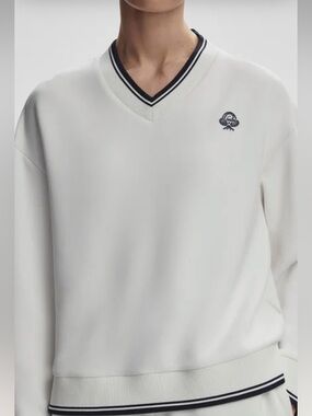 Varley White V-Neck Sweater with Navy Trim and Embroidered Logo